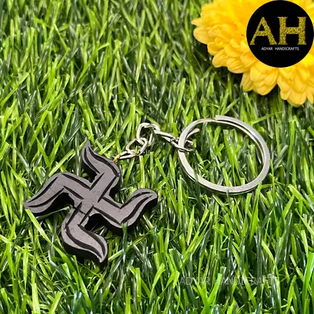 KARUNGALI SWASTIKA KEYCHAIN - image 1
